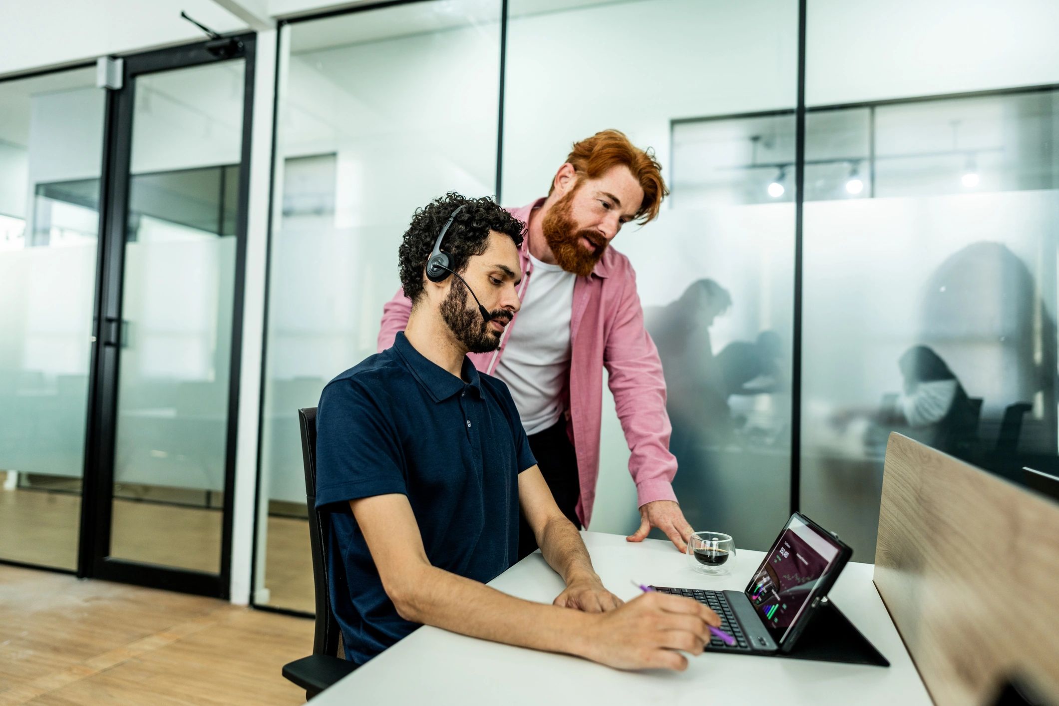Support professional discussing information with a client