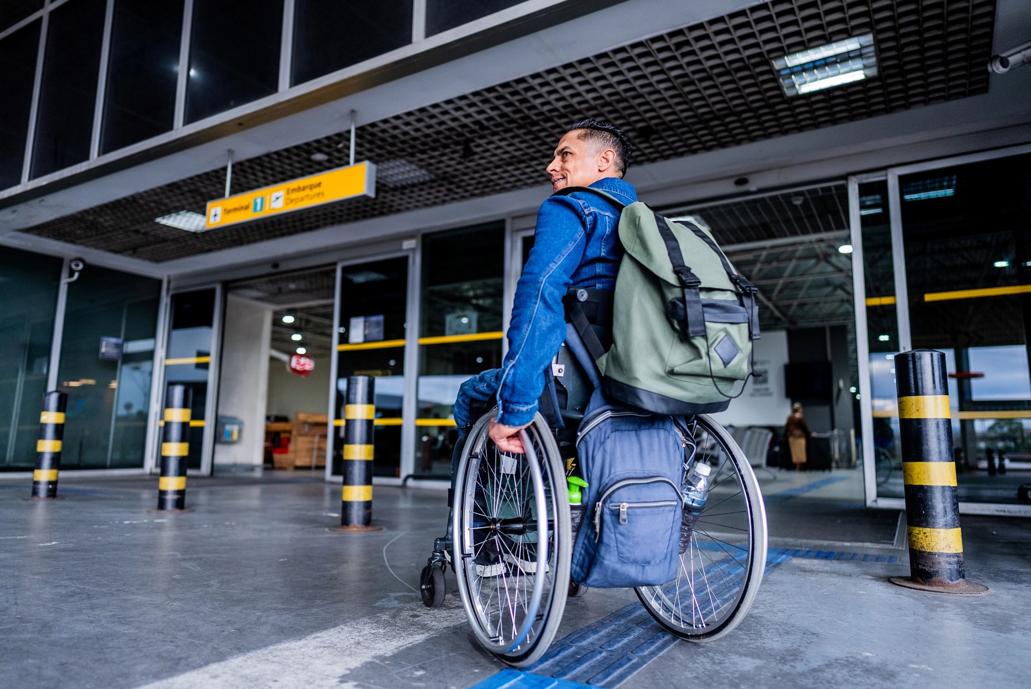 Wheelchair user travelling independently
